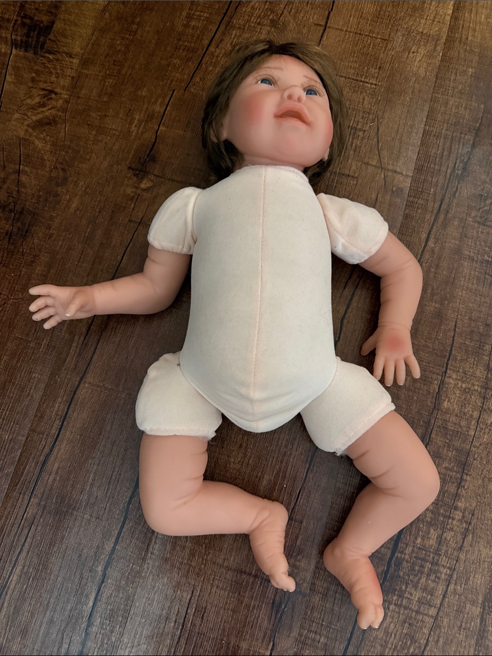 Realistic Baby Doll with Soft Cloth Body and Vinyl Limbs - Cream & Flesh